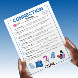 Image of hands holding a Connection Challenge worksheet.