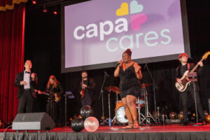 Band in front of CAPACares logo
